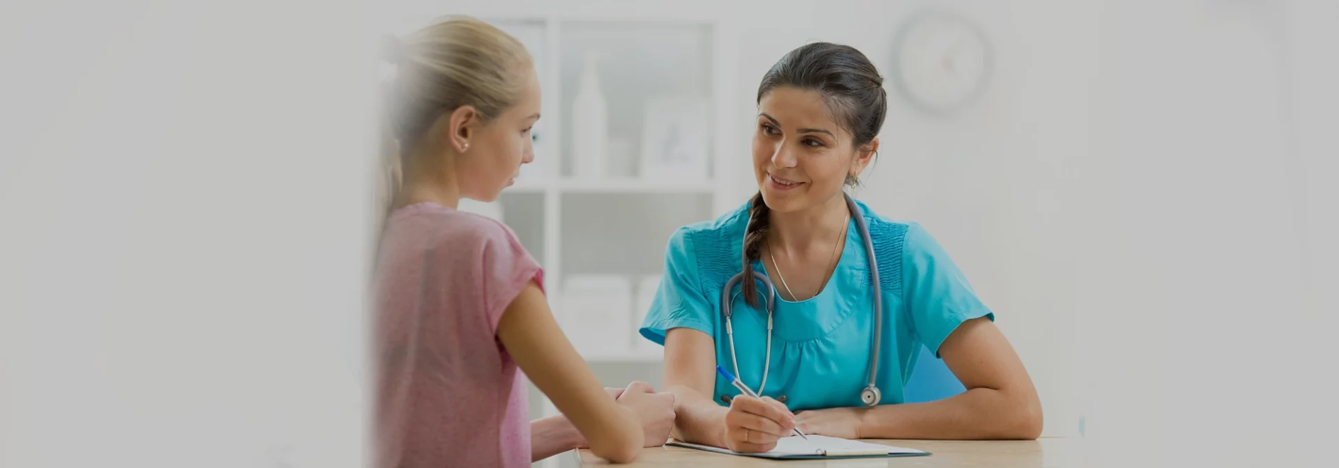 gyno and teen talking at appointment